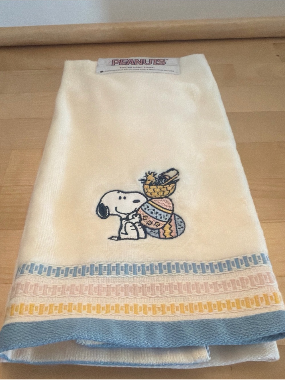Peanuts Easter Cream Hand Towel with Pink Logo Accent